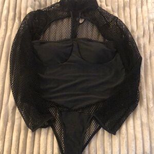 Women’s. Black Body Suit. New never worn.